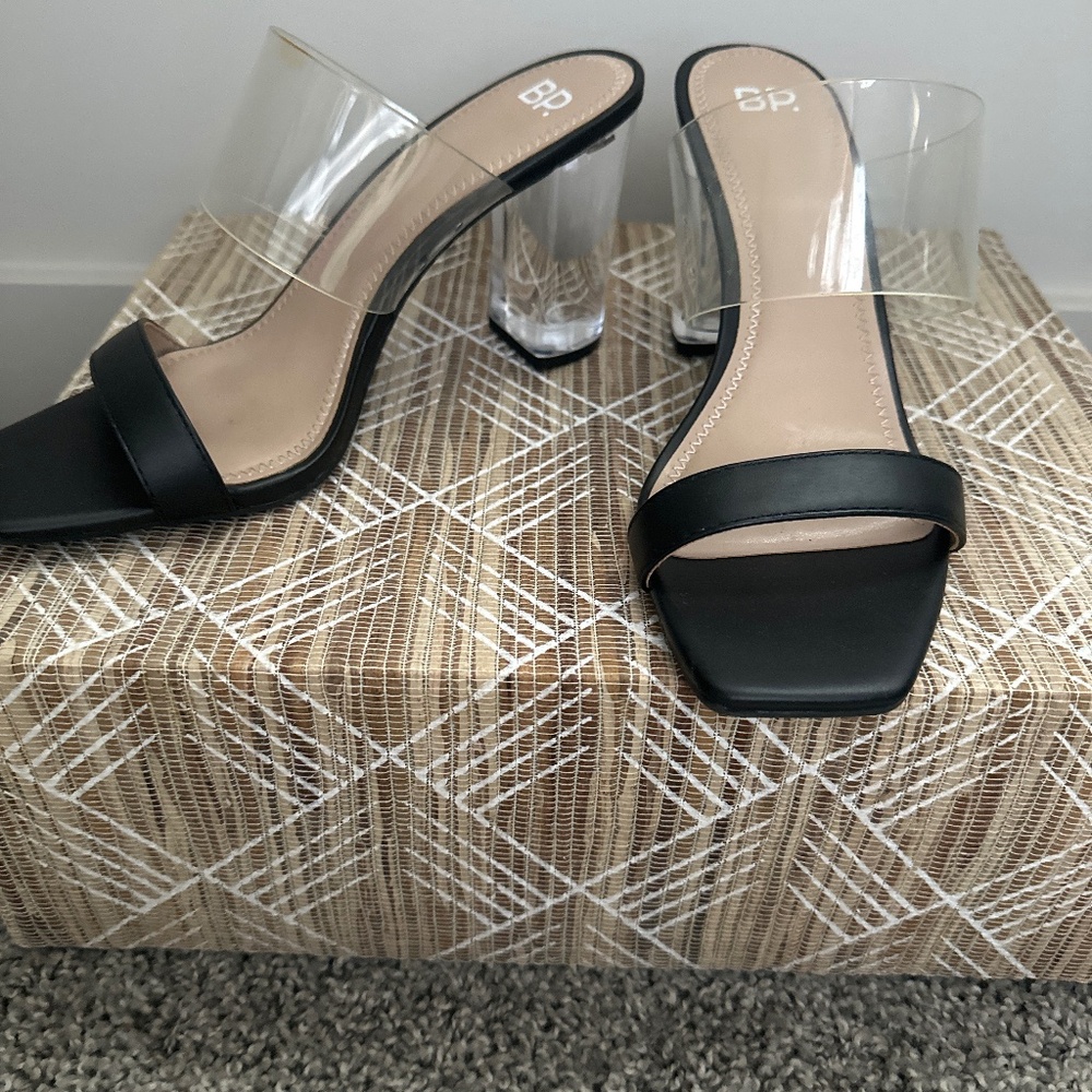 Black sandal with clear heel